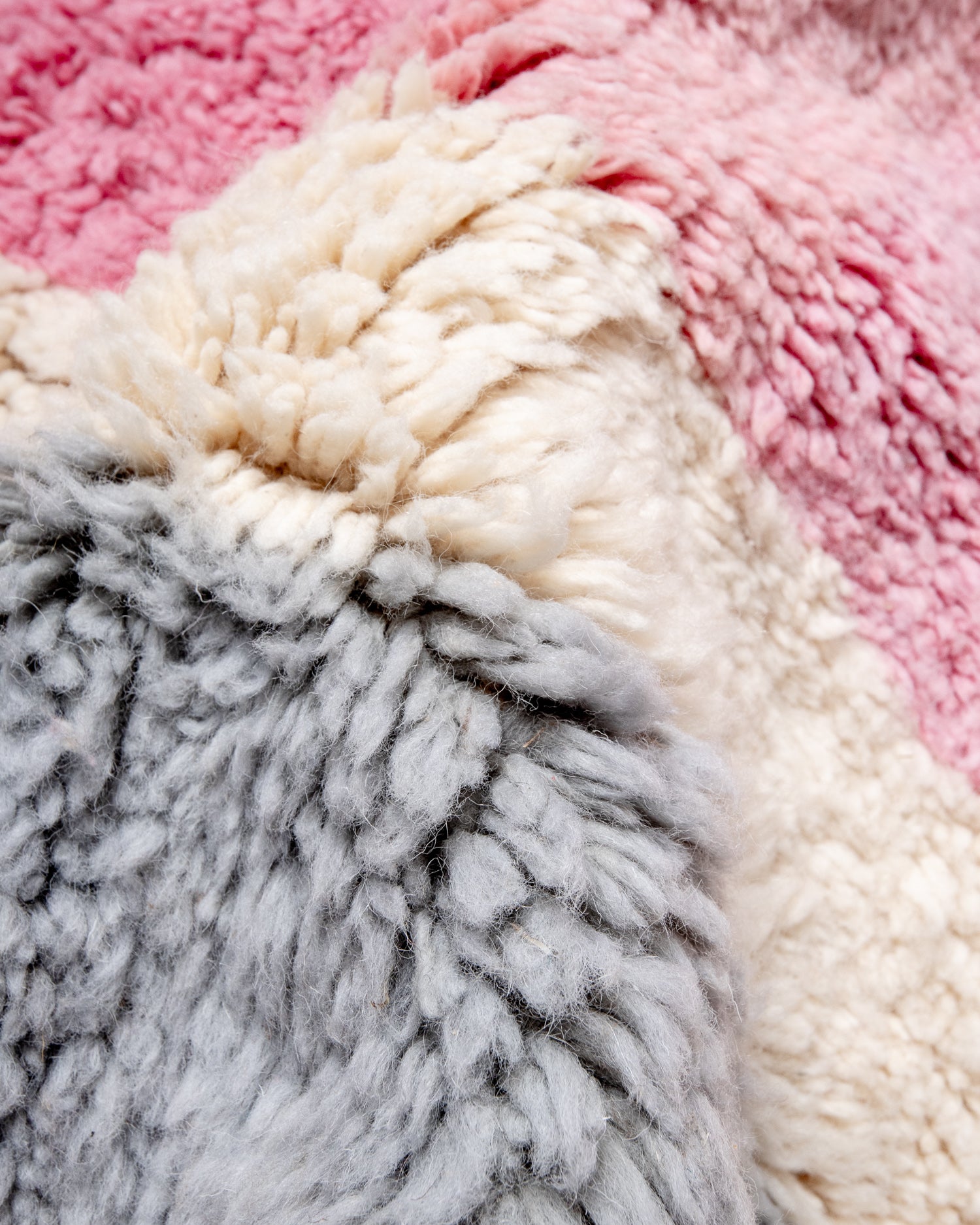Modern, designer, handcrafted Berber rug from Morocco. Beniourain carpet with beautiful colours and patterns and fluffy wool texture.